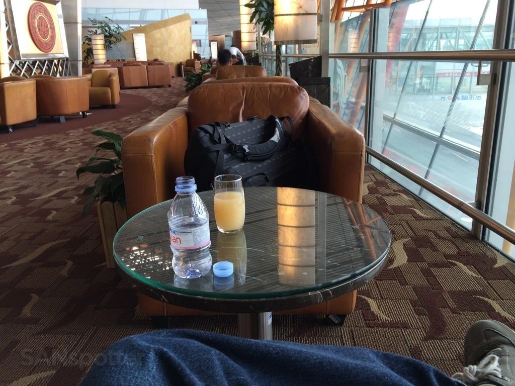 relaxing in the Air China First Class lounge