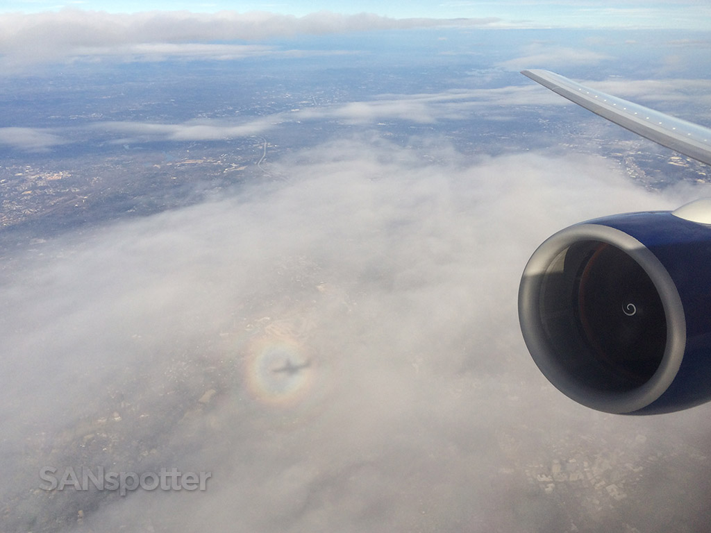 rainbow and airplane shadow