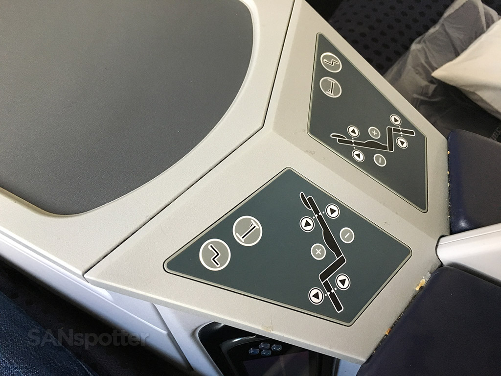 business class lie flat seat controls