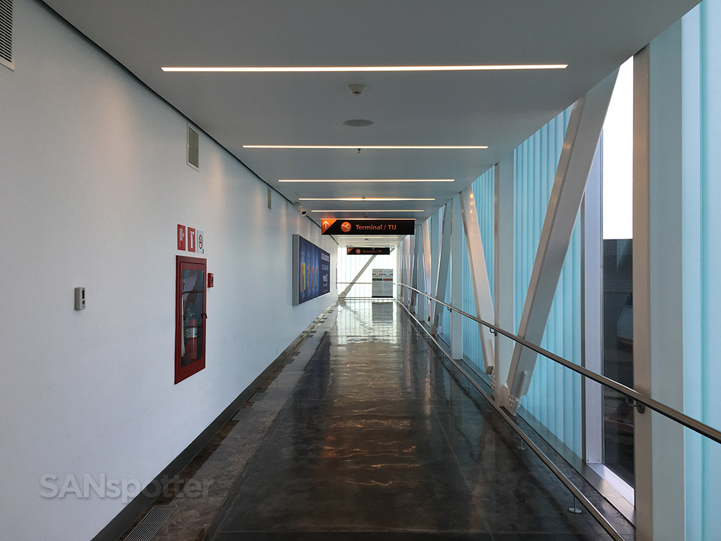 crossing the tijuana airport bridge