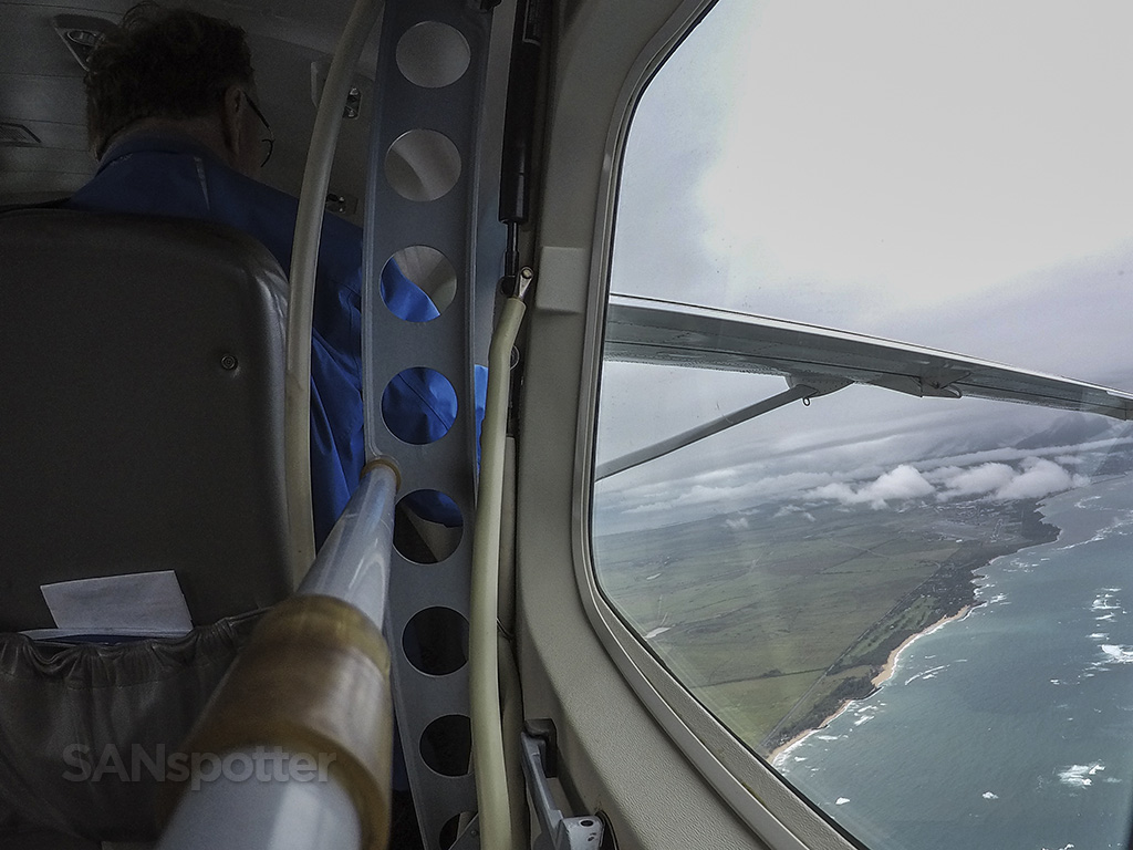 cessna 208 interior flying over maui