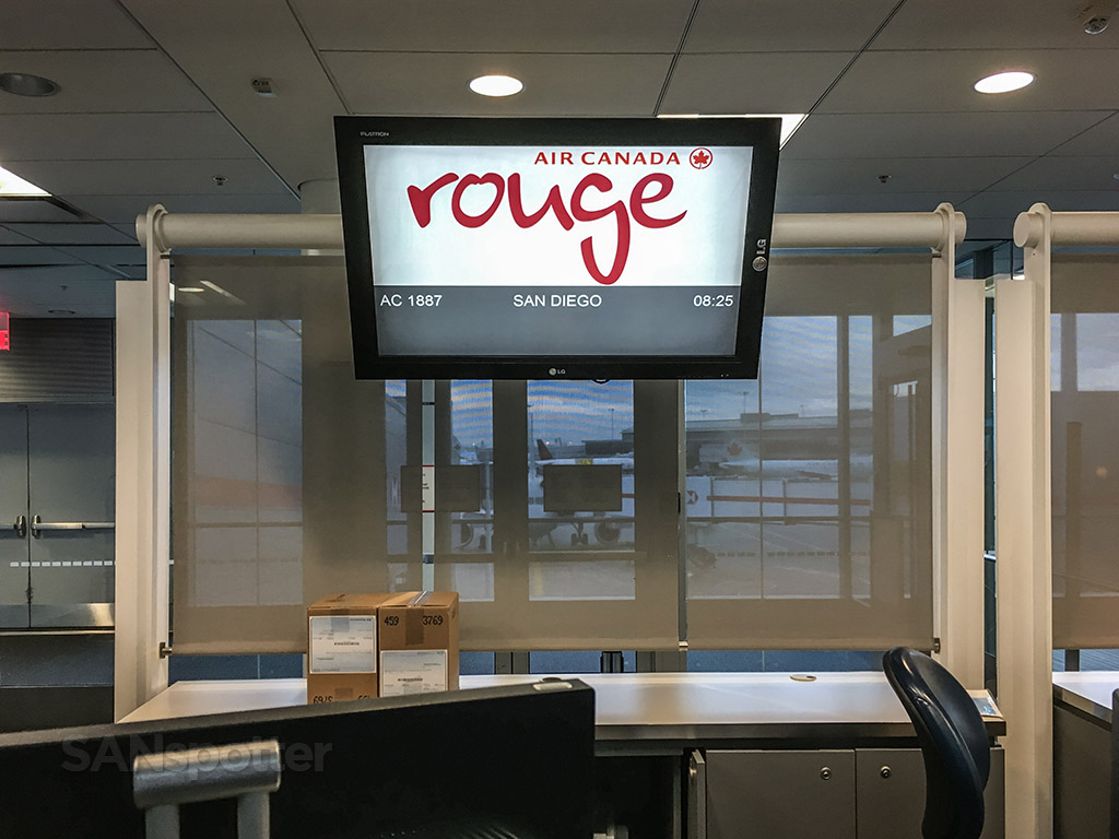 Air Canada Rouge flight information display board YYZ 