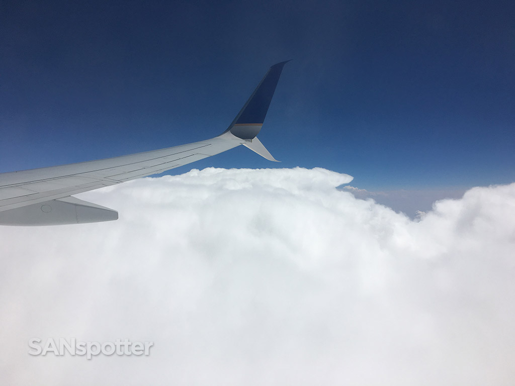 Puffy clouds United airlines 737 wing