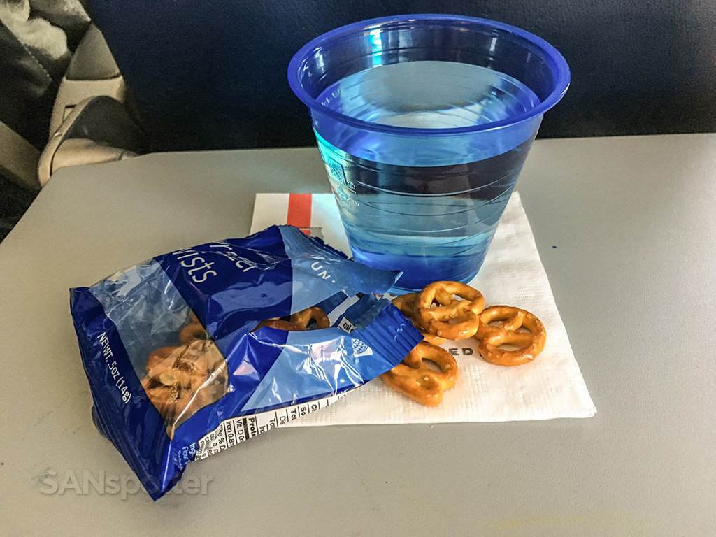 United airlines economy class snack pretzels and water