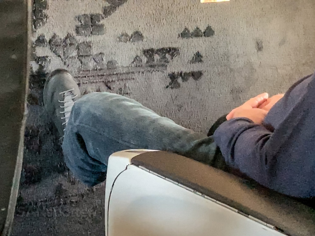 Feet on bulkhead wall