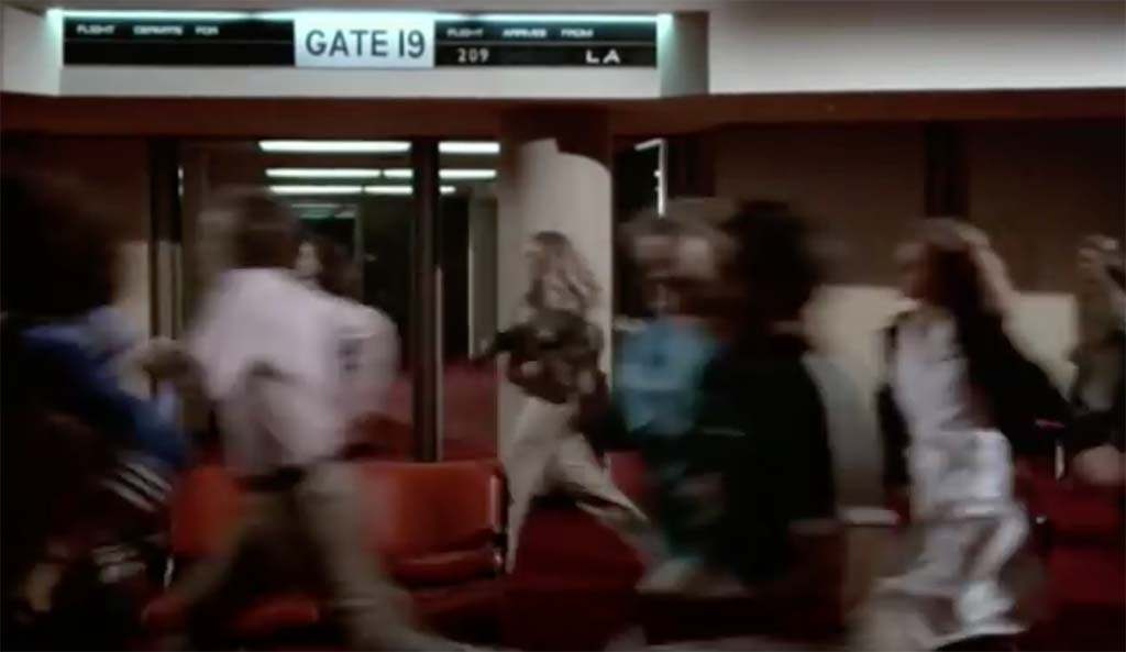 Airplane now arriving at gate 8 movie quote