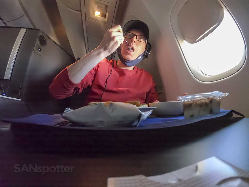 SANspotter eating United airlines business class food