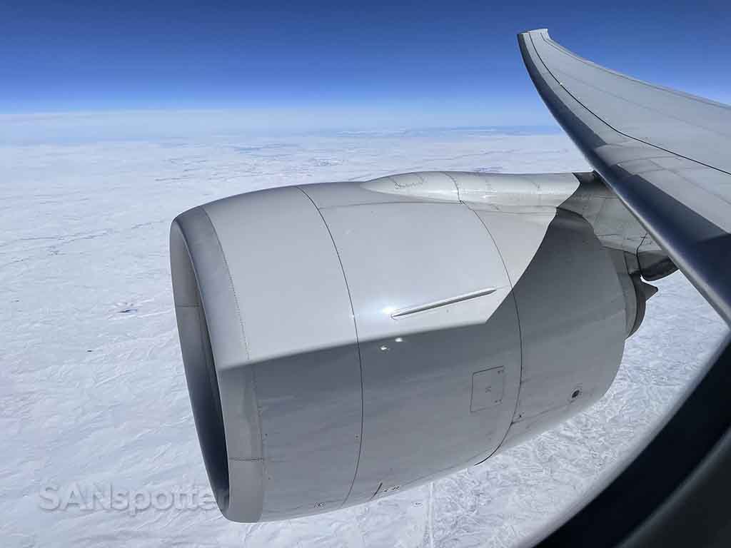 Flying over snowy plains United 777-300er