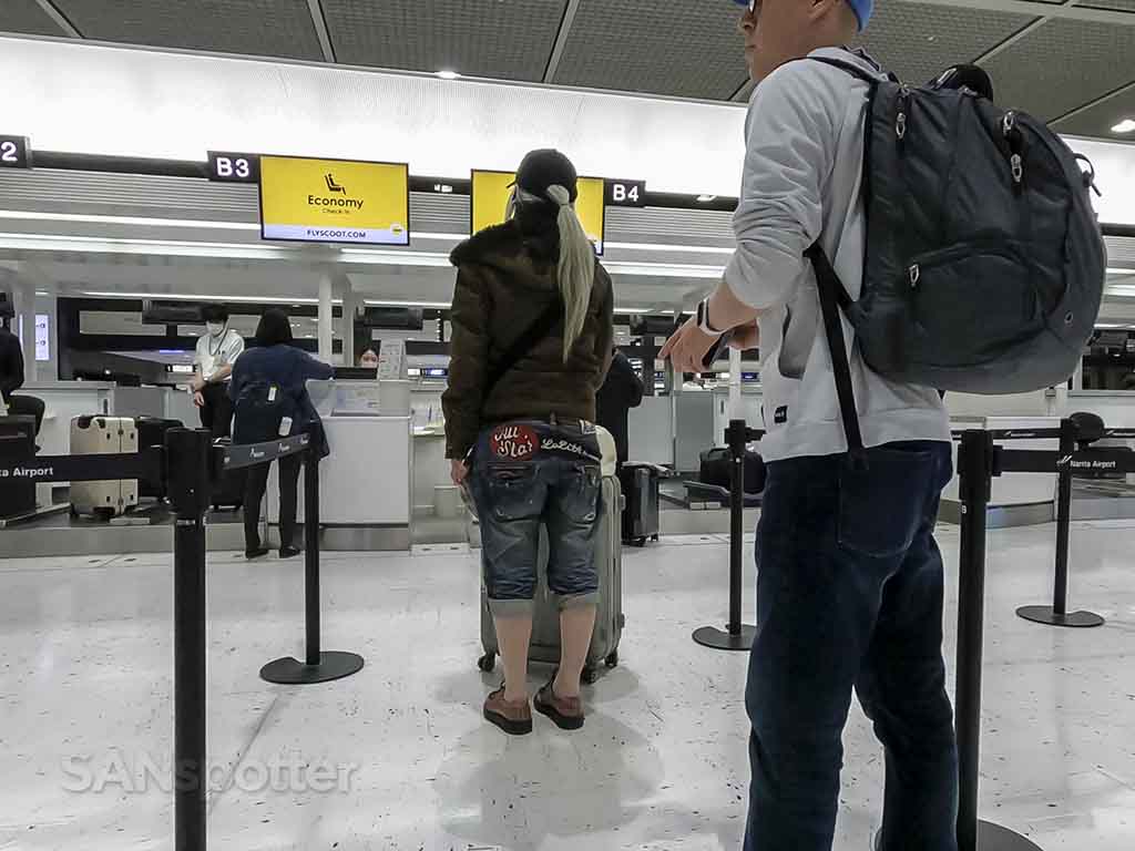 Checking in for Scoot flight at NRT airport