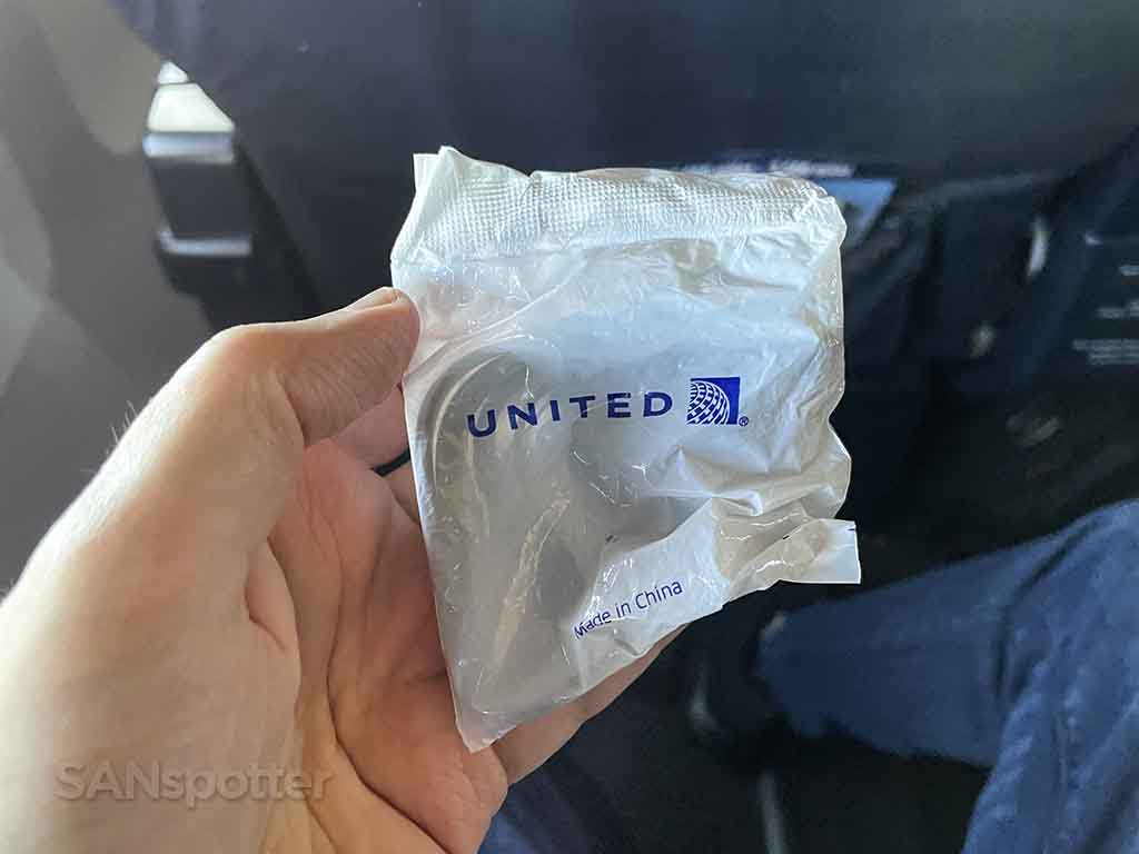United domestic first class earbuds. 