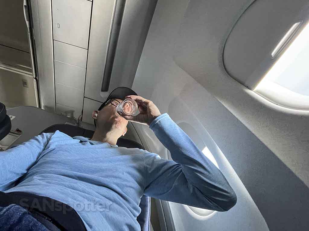 SANspotter taking a drink in first class