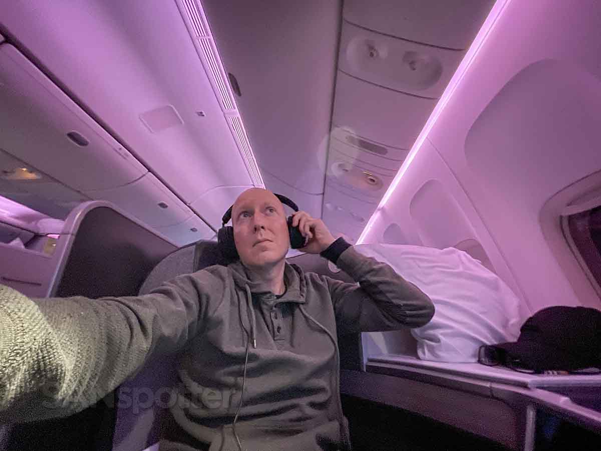 SANspotter selfie Air Canada 777-300 business class trying on headphones 