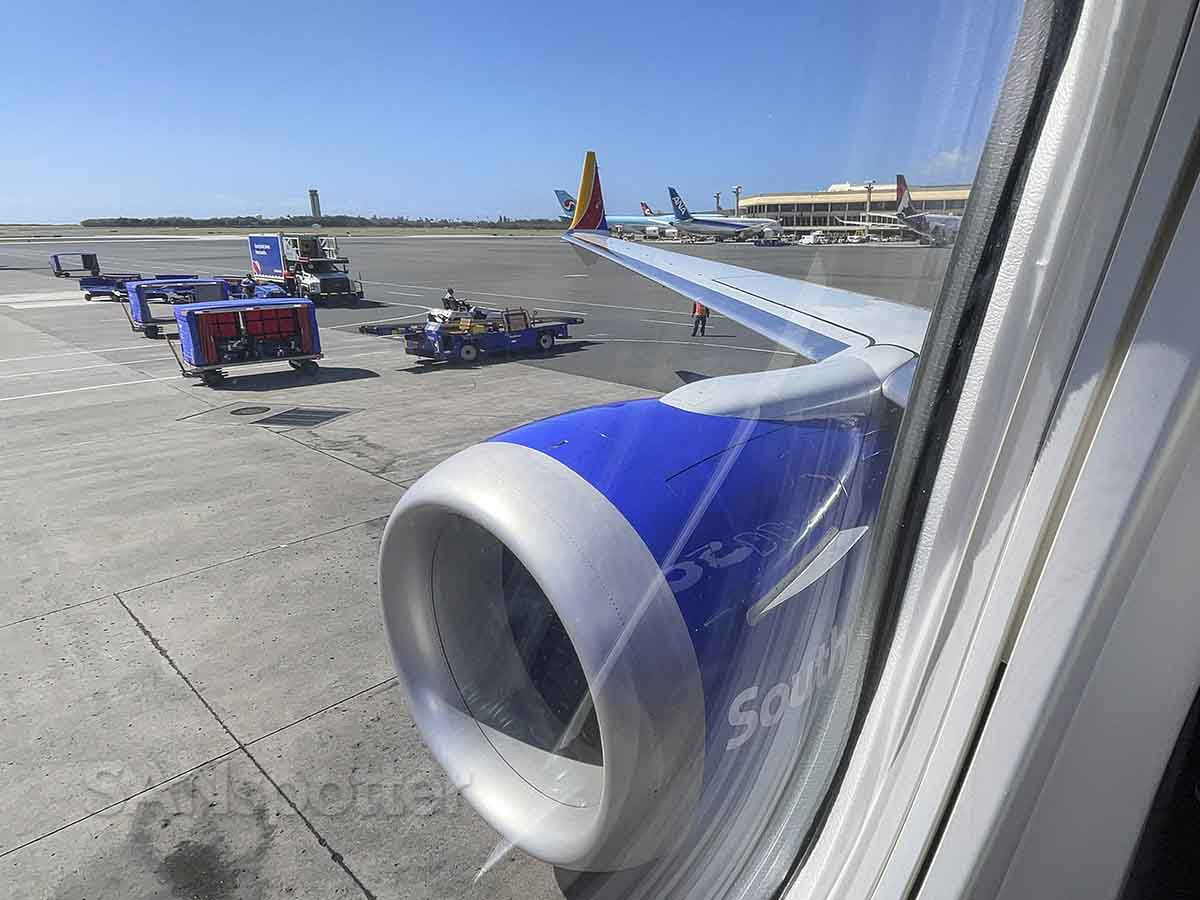 Southwest 737 max 8 pulling up to the gate at HNL