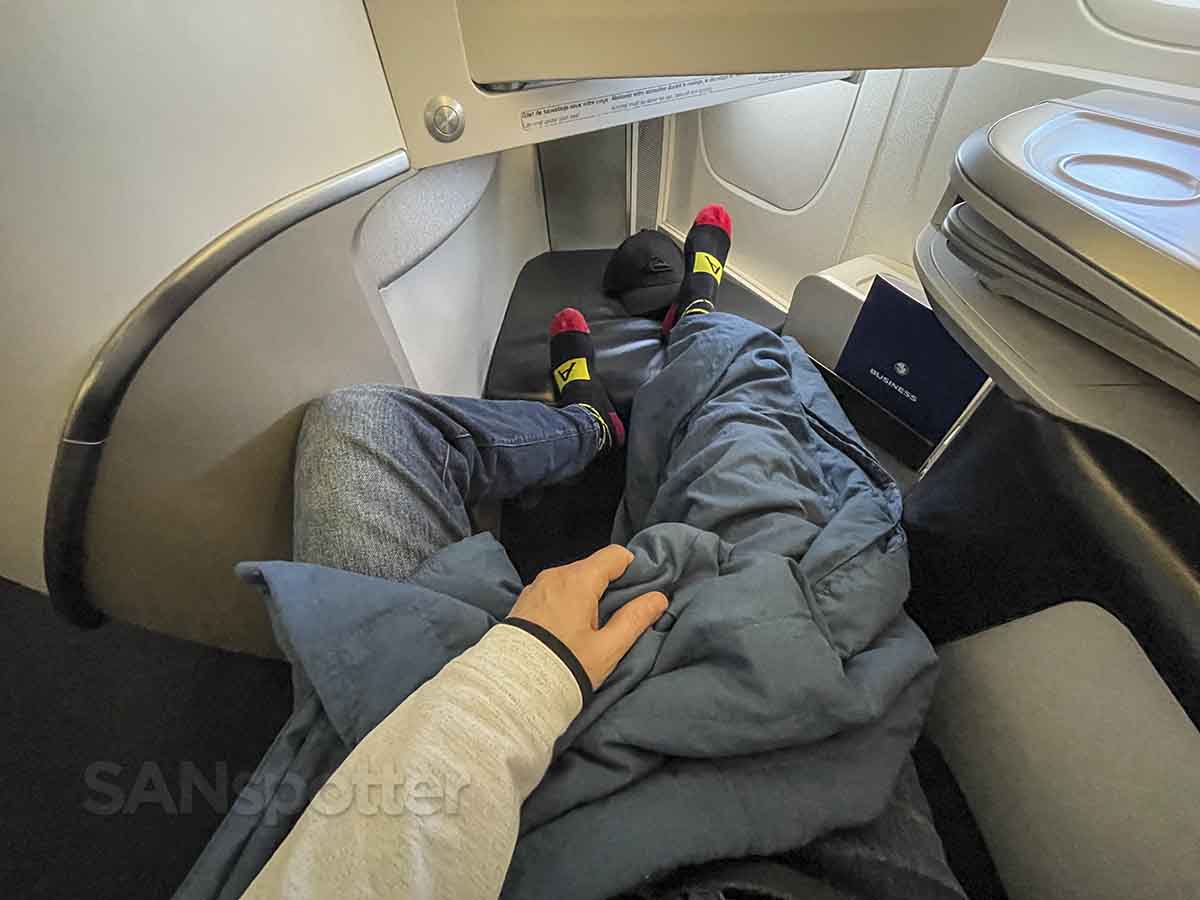 Relaxing in a lie flat Air France 777-300 business class seat