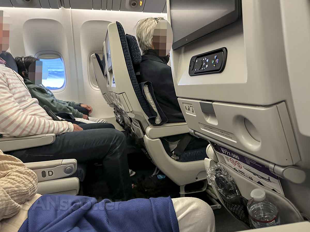 ANA 777-300 economy class tired passengers 