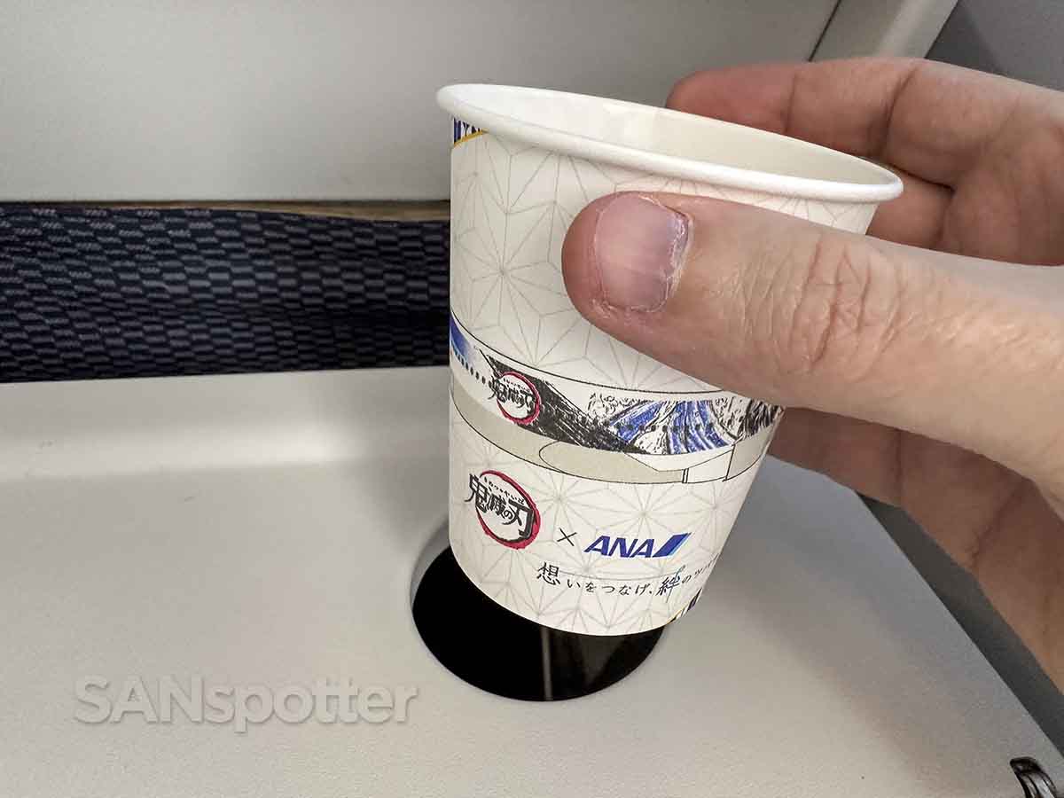 ANA 787-8 economy tray table cup holder