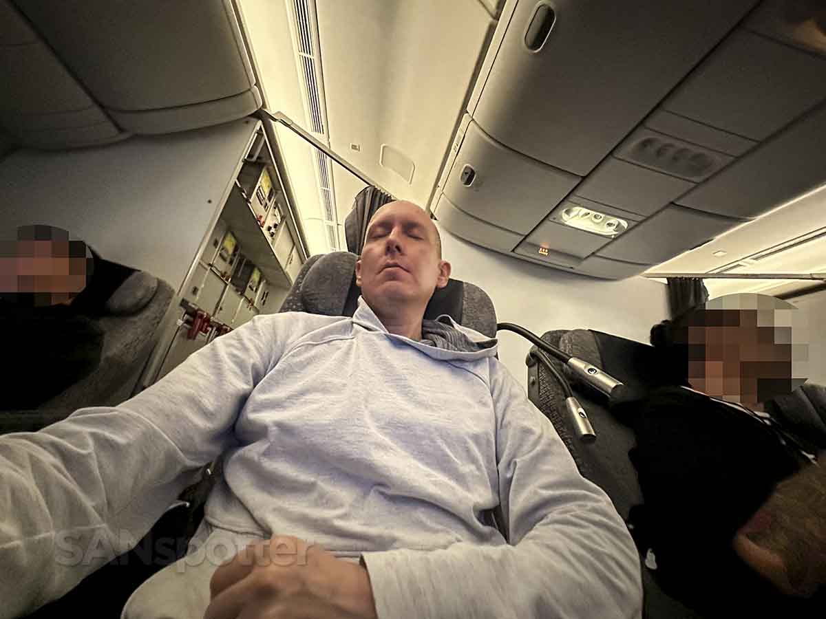 SANspotter sleeping in an ANA 777-300ER premium economy seat