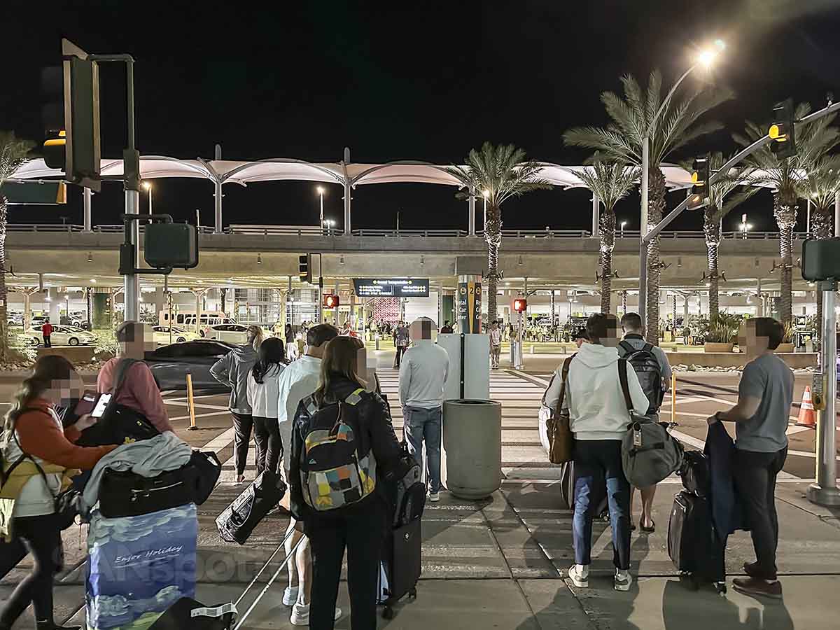 Crossing the street at the San Diego airport to catch an uber terminal 2 West