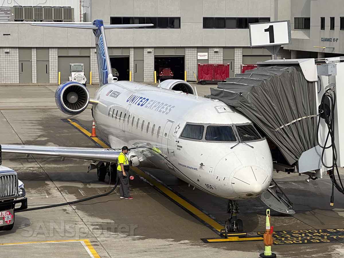 United Express CRJ-200 parked at gate 1 Flint bishop international airport