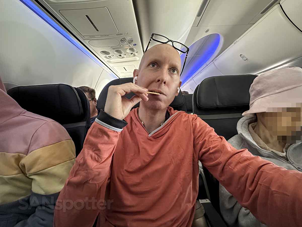 SANspotter eating fruit and cheese platter in Alaska Airlines 737 MAX economy class