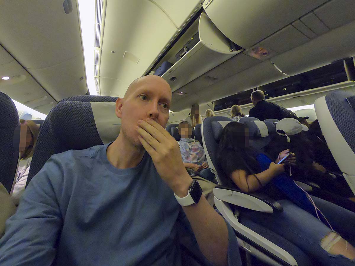 Scott Leazenby sitting in British Airways 777-300ER economy class