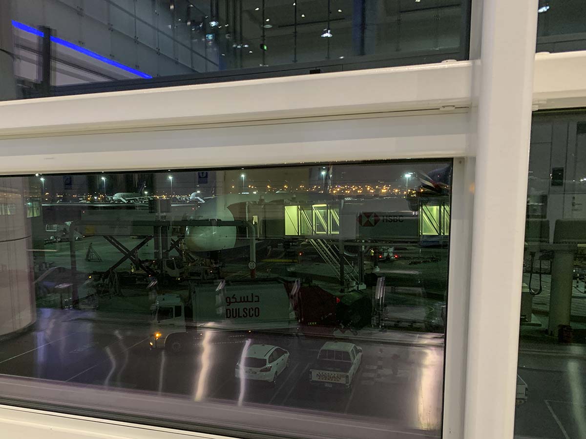 British Airways 777-300ER parked at gate D6 Dubai international airport