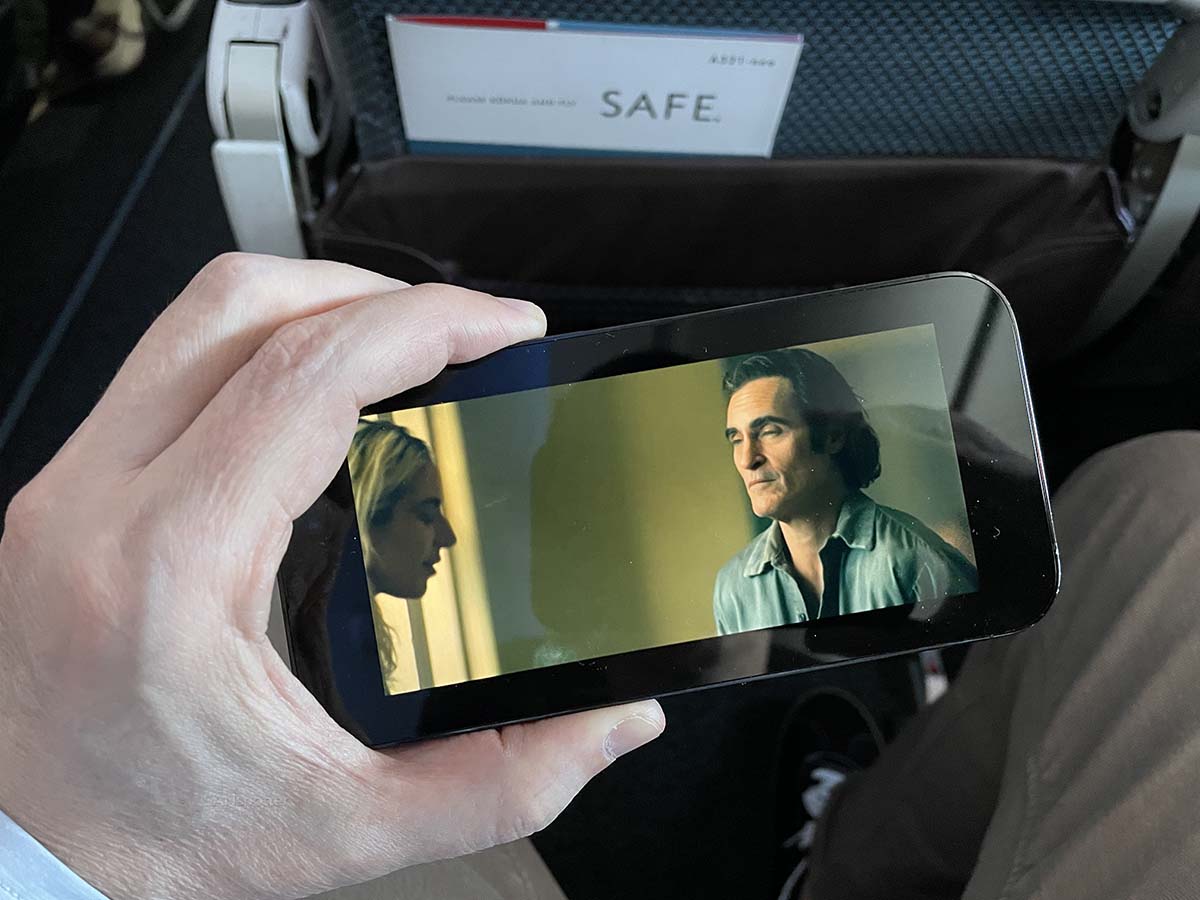 Watching movies on my phone Hawaiian Airlines A321neo Extra Comfort