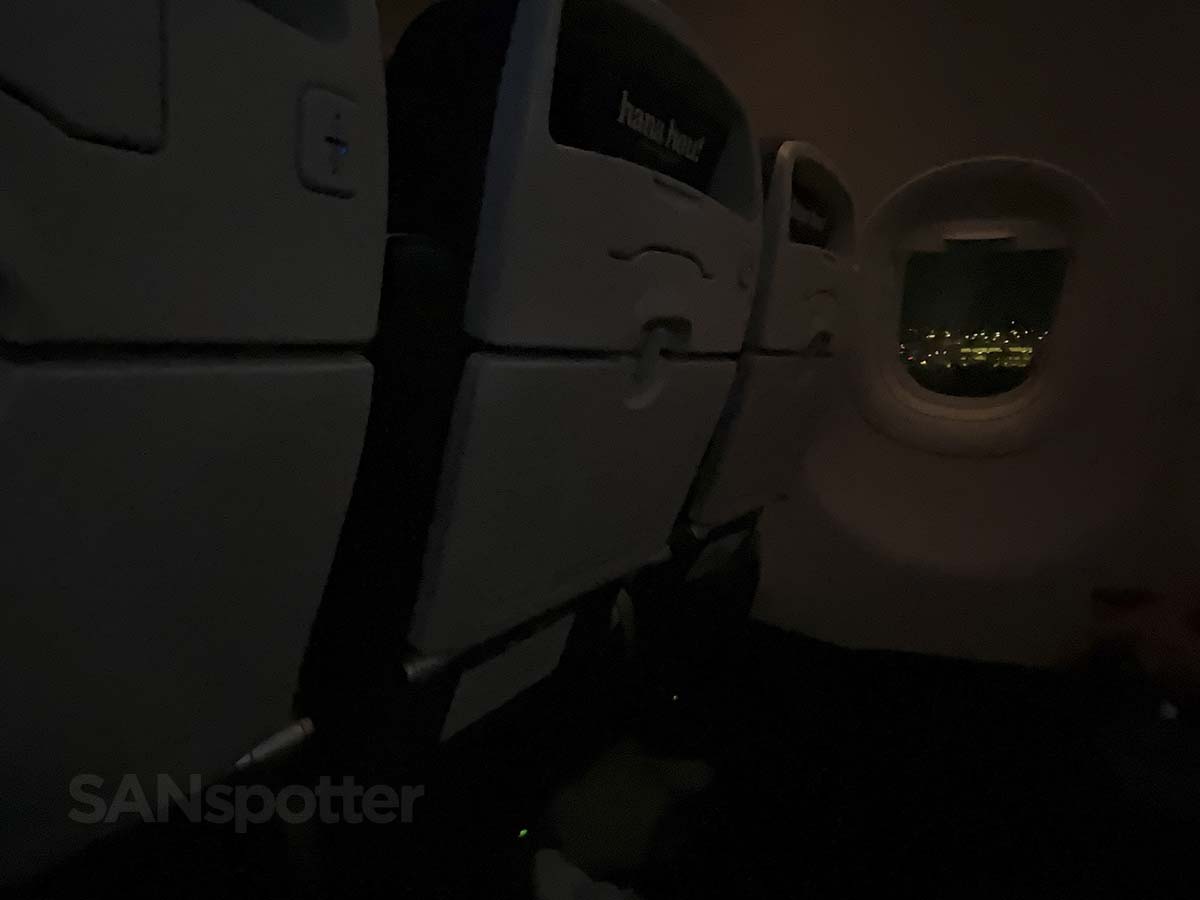 Looking out the window of a Hawaiian Airlines A321neo while approaching the San Diego airport at night