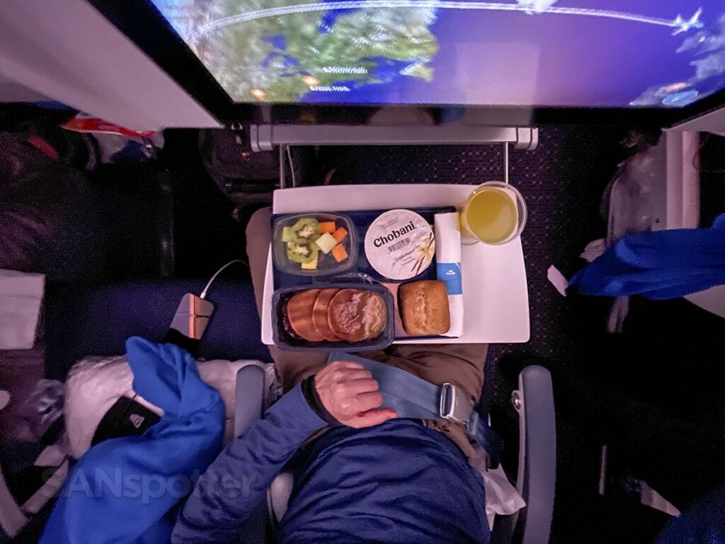 Preparing to eat breakfast in KLM 787-9 Economy Comfort 