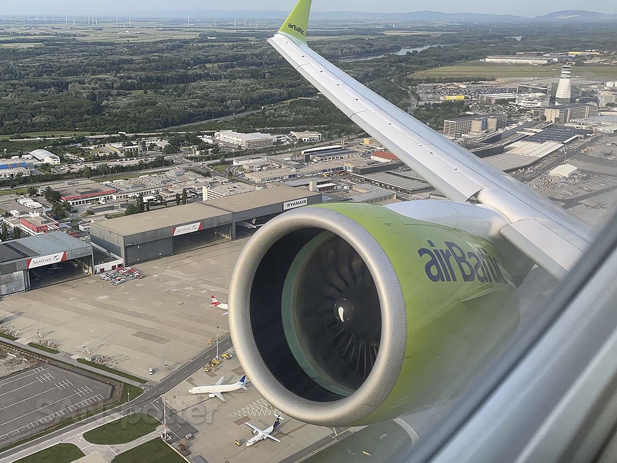 Air Baltic A220-300 taking off from runway 29 Vienna airport