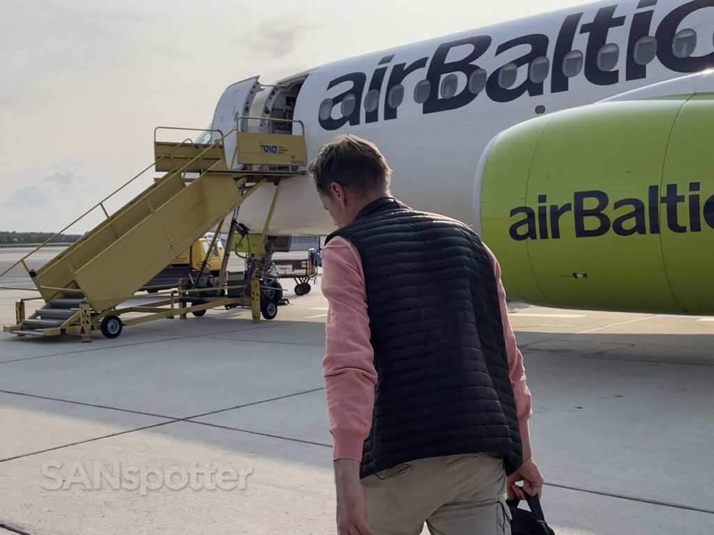 Walking up to an Air Baltic A220-300