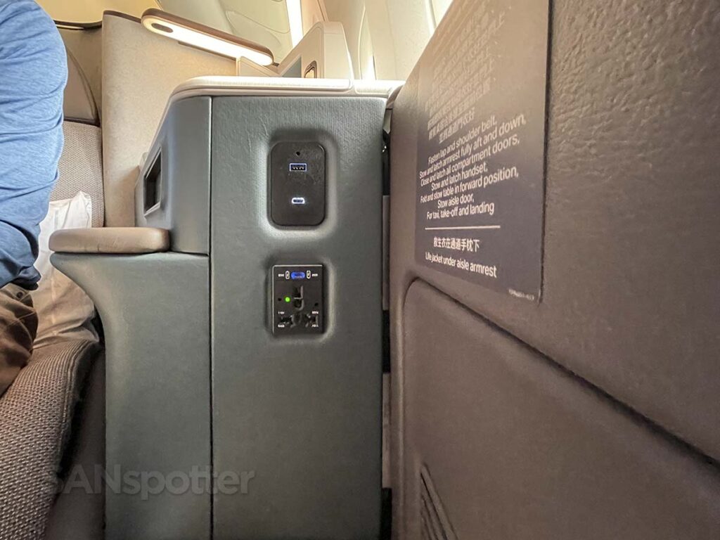 Cathay Pacific 777-300ER business class electrical outlets and USB charging ports