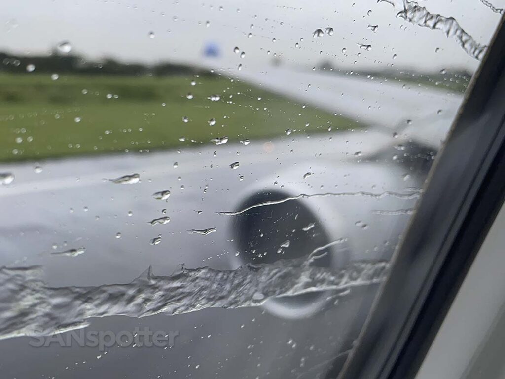 China Airlines A330-300 rolling down the runway in the rain at TPE