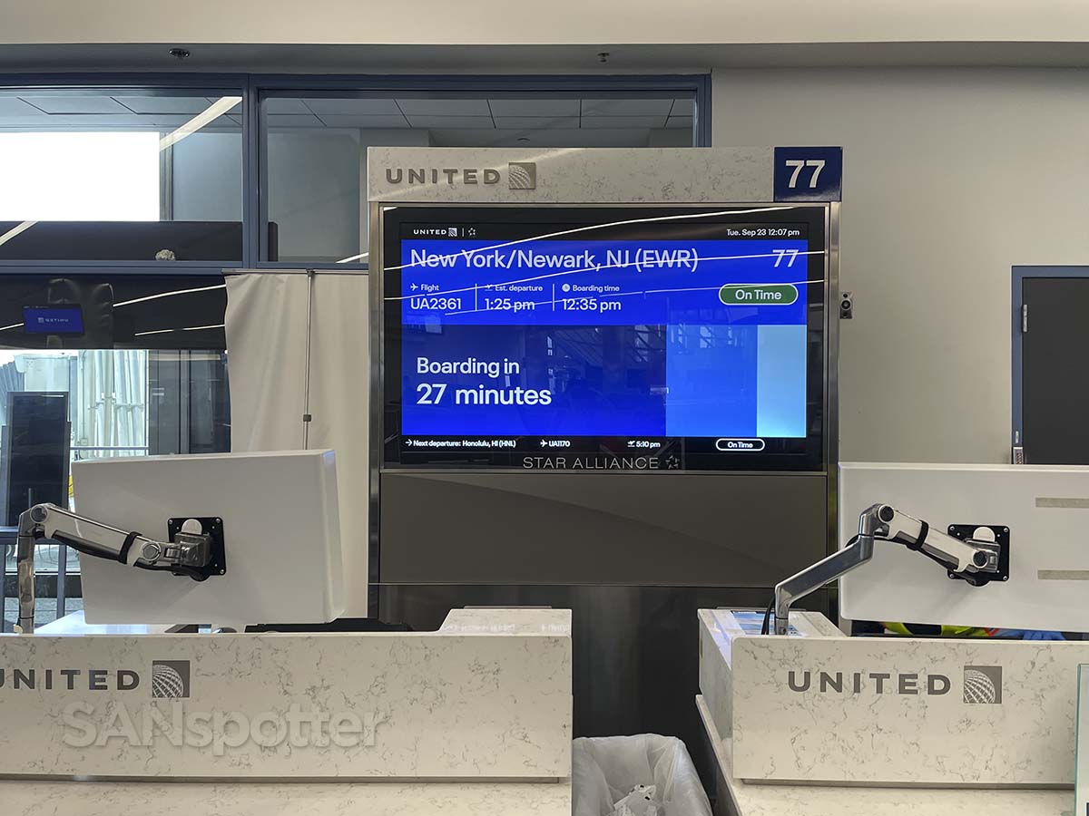 United Airlines flight information display gate 77 terminal 7 LAX