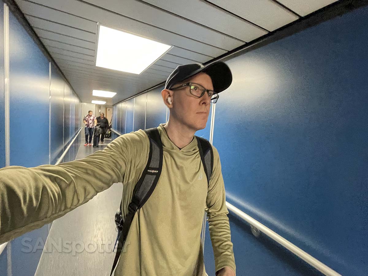 Scott (SANspotter) walking down the jet bridge at gate 77 turn on 7 LAX