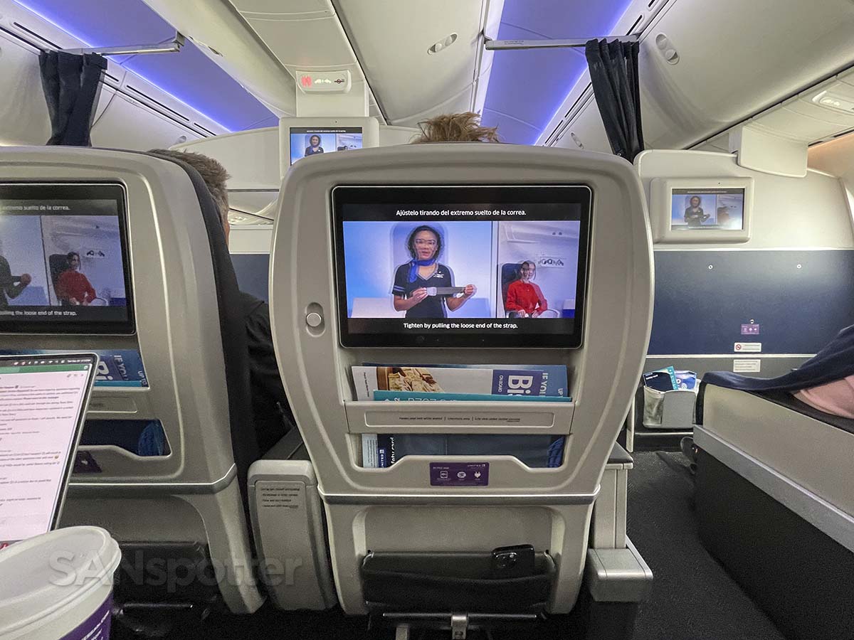 United Airlines 787-9 premium plus safety video playing on the video screen