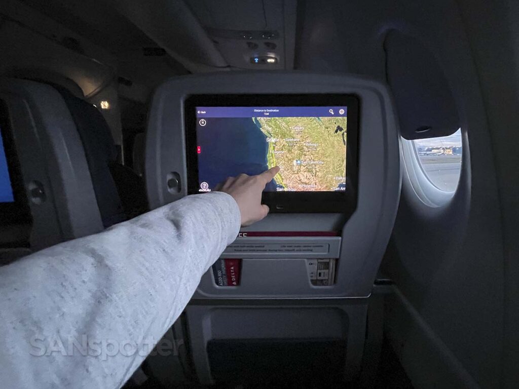 Checking the in-flight map just moments after arrival in Seattle in Delta A220-100 first class