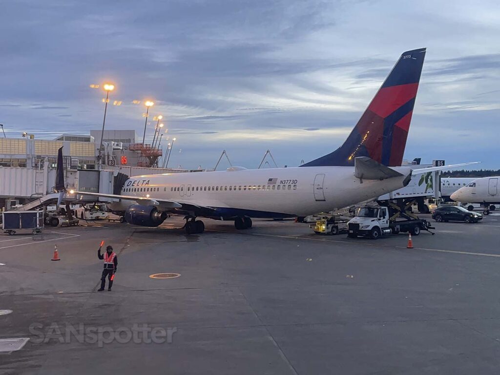 Pulling up to the gate next to a Delta 737-800 at the Seattle Tacoma airport