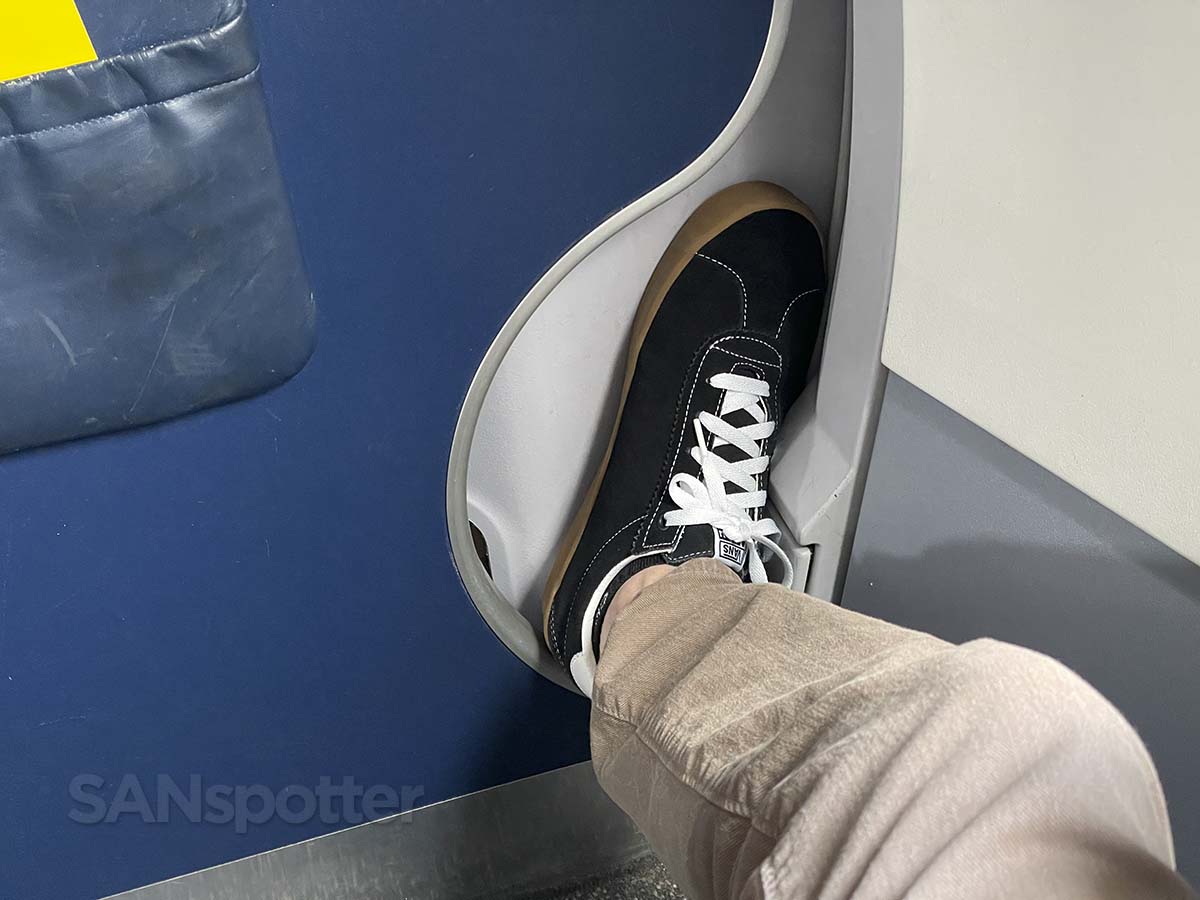 Spirit Airlines A320 first class bulkhead wall foot cut out