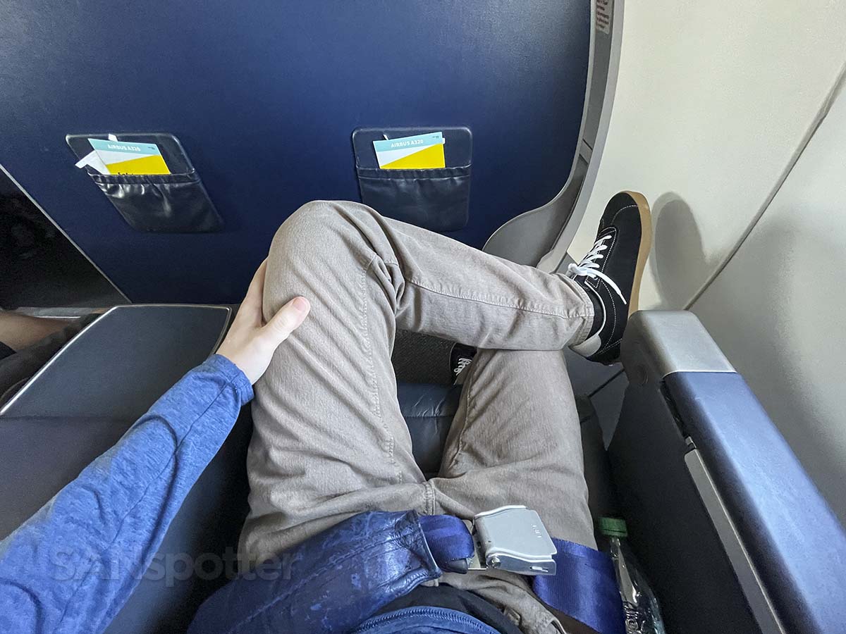 Sitting with my legs crossed inSpirit Airlines A320 first class