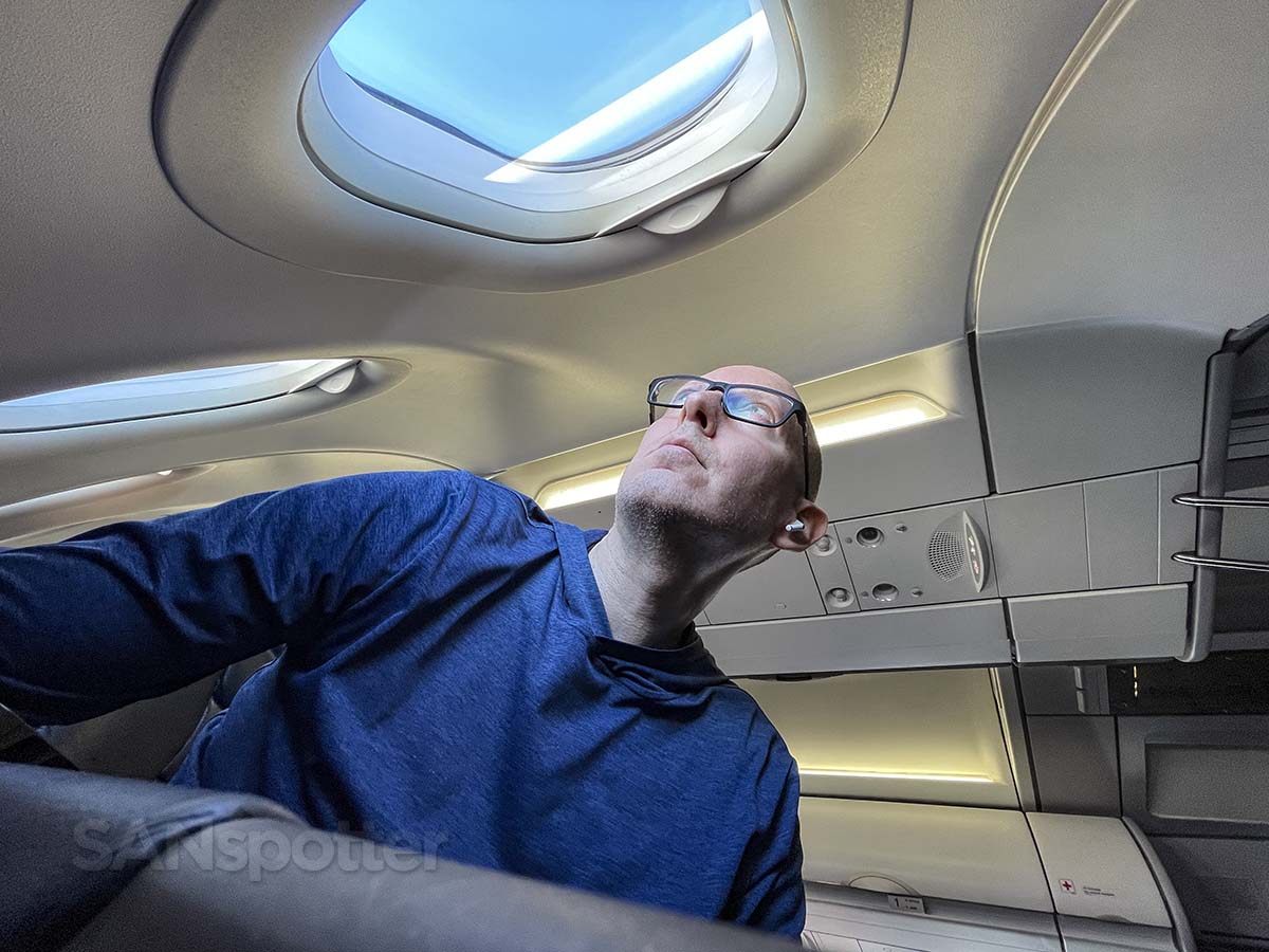 Scott (SANspotter) looking out the window a of a Spirit Airlines A320