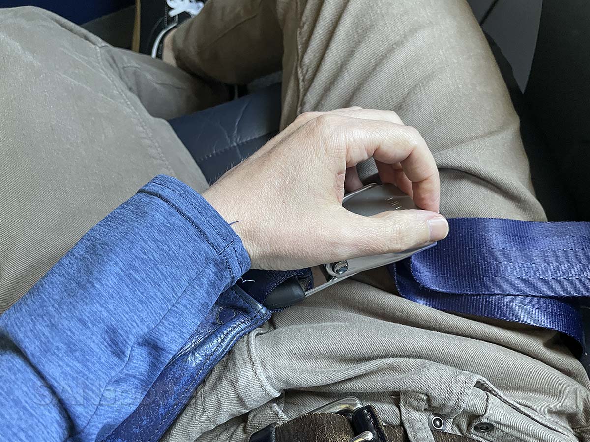Unbuckling my airbag seatbelt in Spirit Airlines A320 first class