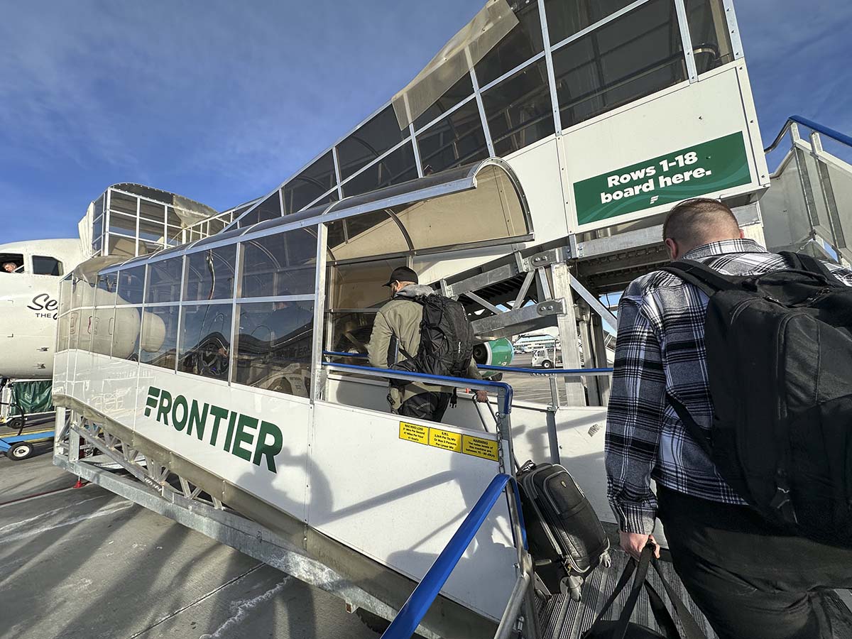 Boarding a frontier airlines A321 via stairs at the Denver International Airport