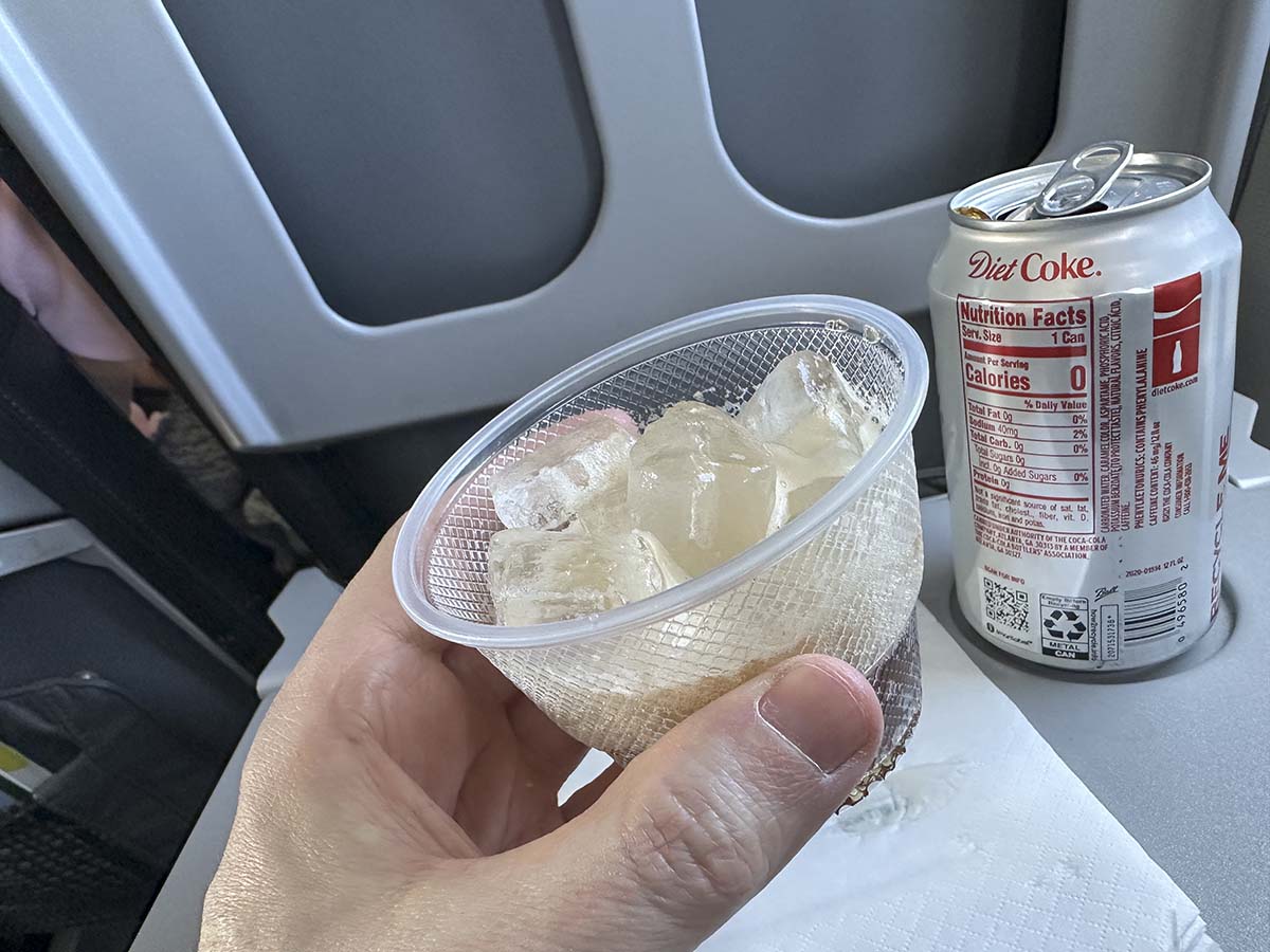 Drinking Diet Coke in Frontier Airlines A321 UpFront Plus