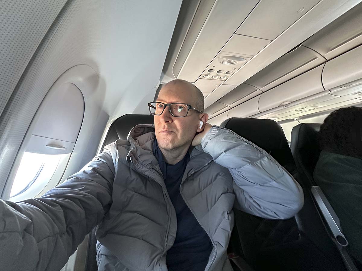 Scott Leazenby testing out the headrests in Frontier Airlines A321 UpFront Plus