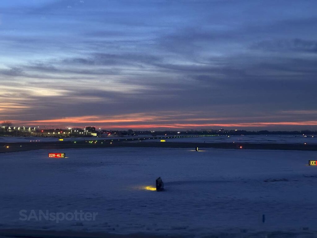 Taxi to runway at JFK airport at sunrise in the winter time