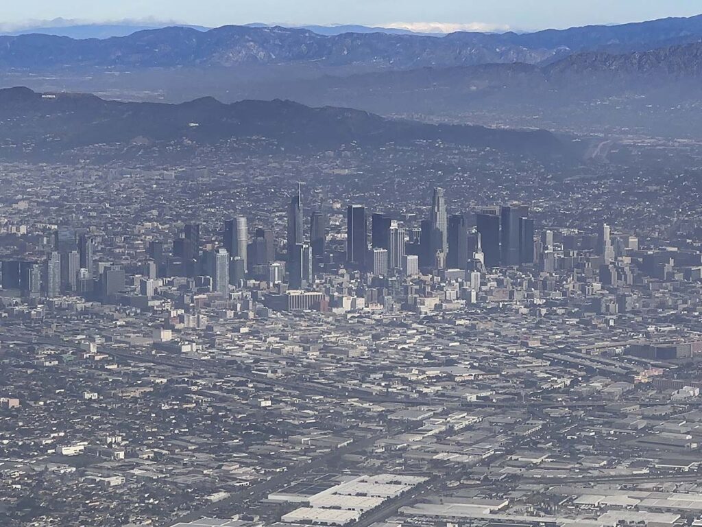 View of downtown Los Angeles while un approach to runway 24R at LAX at approximately 9:30 AM