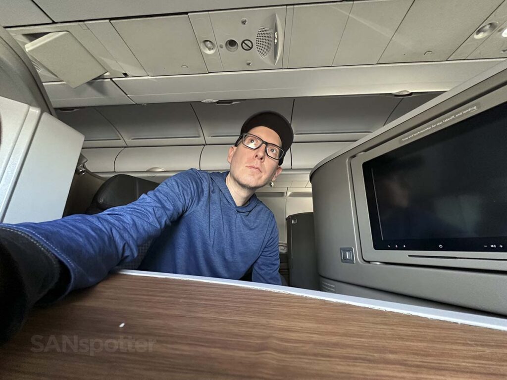 Scott (SANspotter) looking out the window of seat 3F in American Airlines A321T Flagship First 
