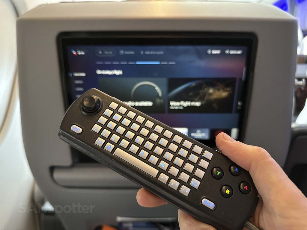 American Airlines A321XLR premium economy in-flight entertainment remote control back (showing keypad)