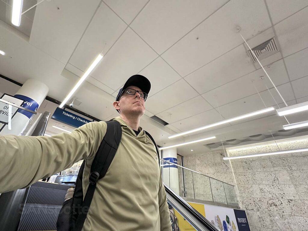 Scott (SANspotter) going down the escalator to level 2 West Palm Beach International Airport